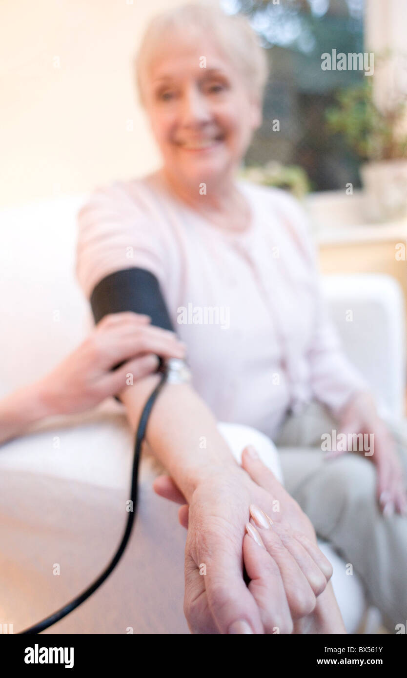 Measuring blood pressure Stock Photo