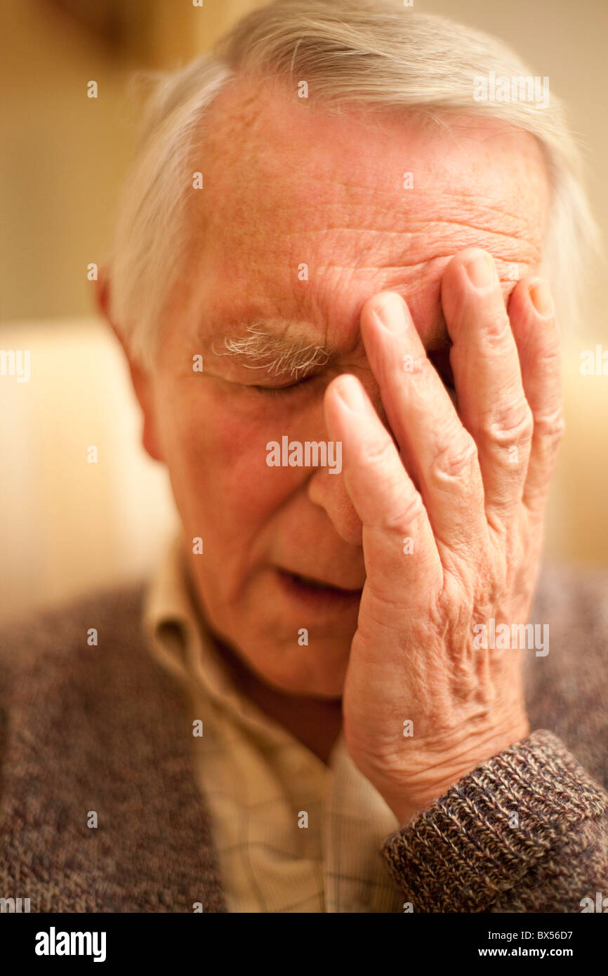 Depressed senior man Stock Photo