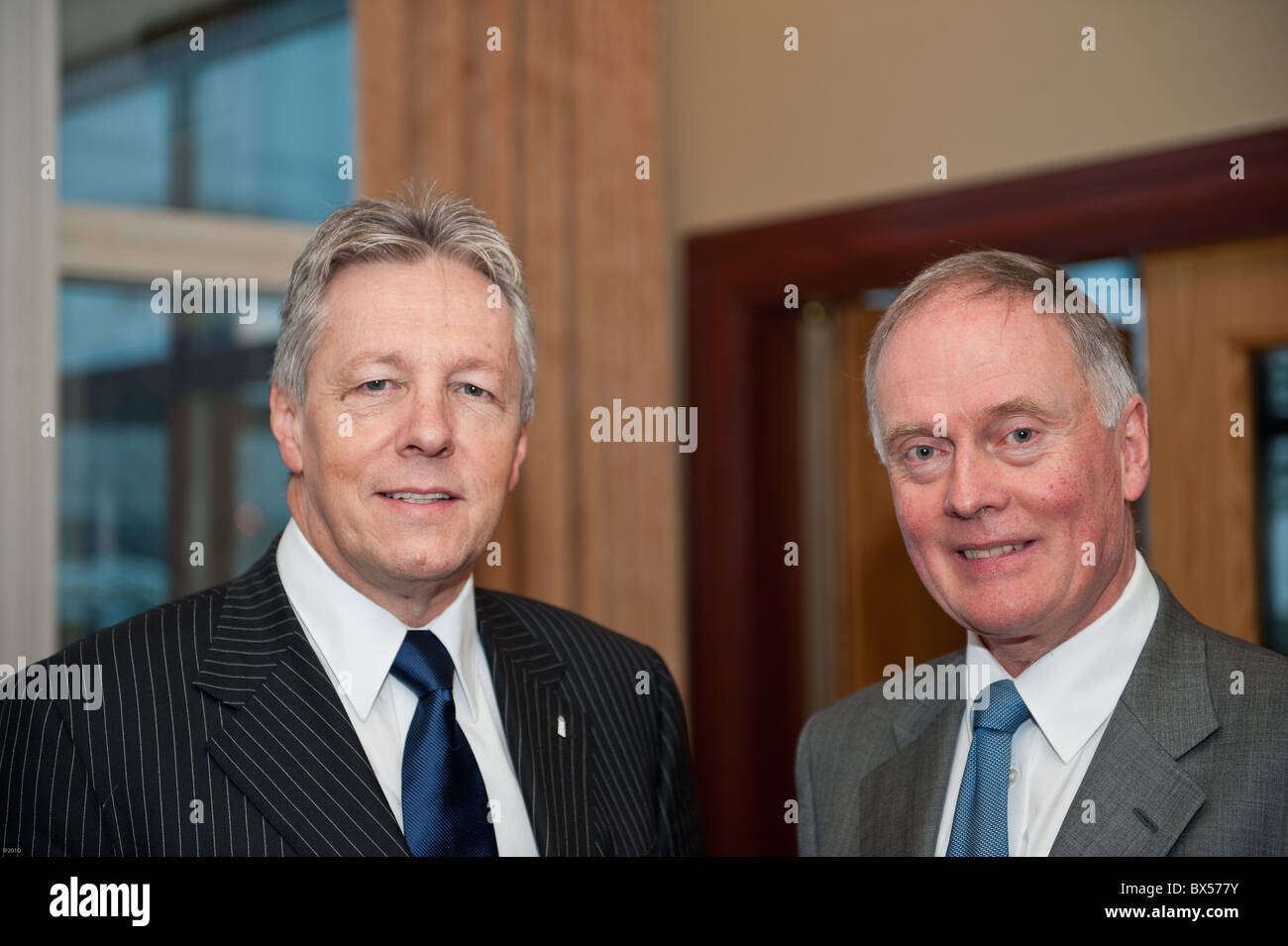 Peter Robinson MLA, First Minister, Northern Ireland Assembly (left) with John Hunter CB (right) Chairman of the Chief Executive Stock Photo