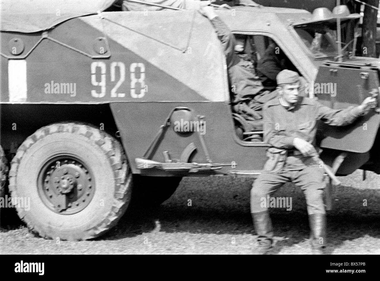 soldier, submachine gun, armoured vehicle, Prague Stock Photo