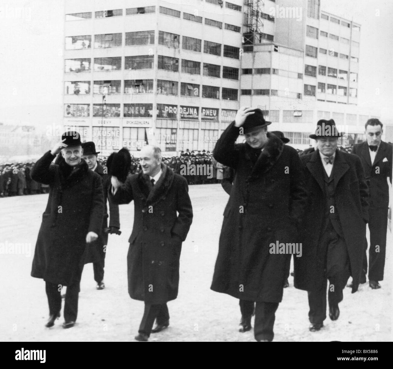 Czechoslovak Foreign Minister Edvard Benes middle walks with Jan Antonin Bata in Zlin Czechoslovakia in 1935. Bata company Stock Photo