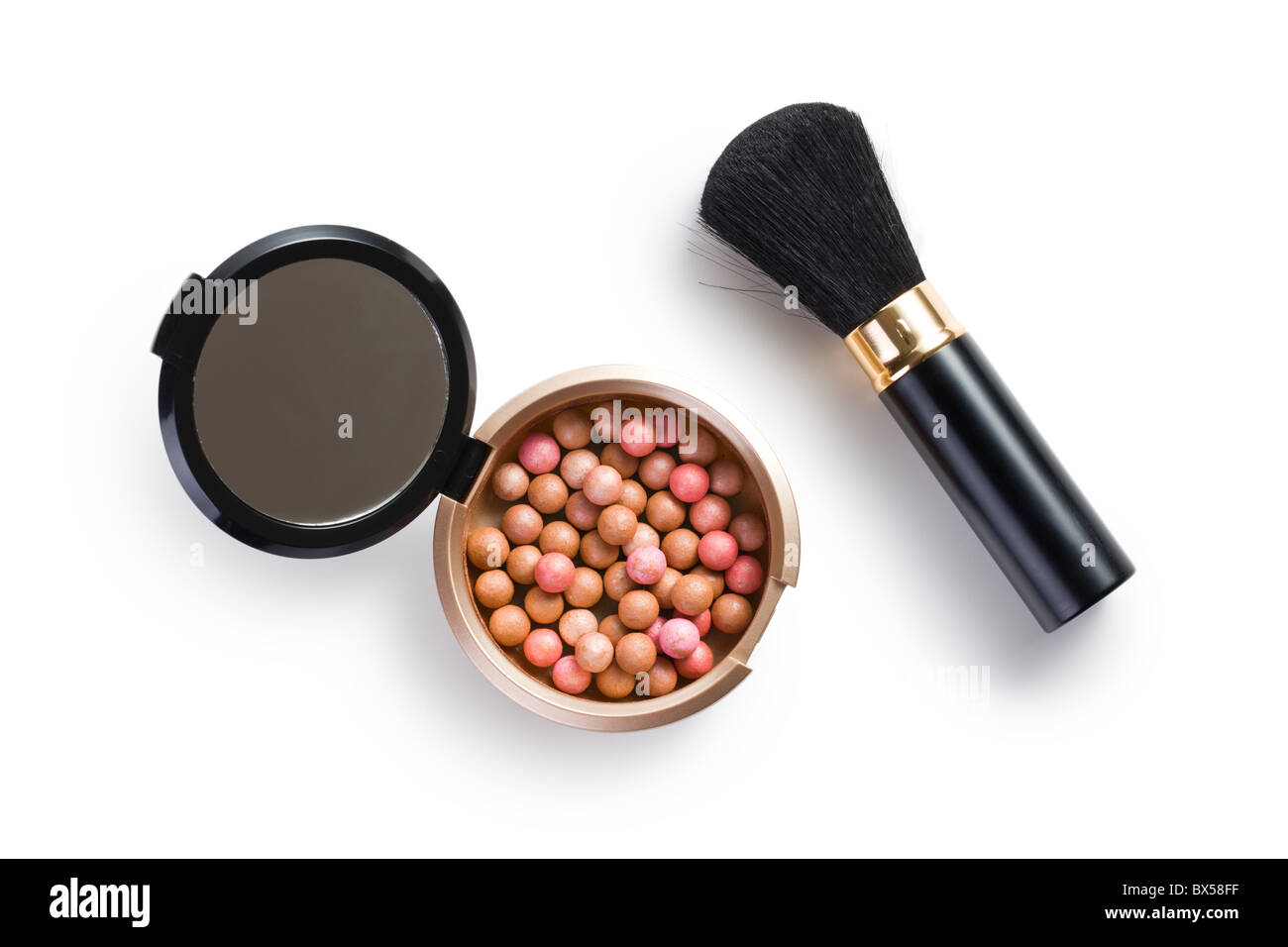 the bronzing pearls and makeup brush Stock Photo Alamy