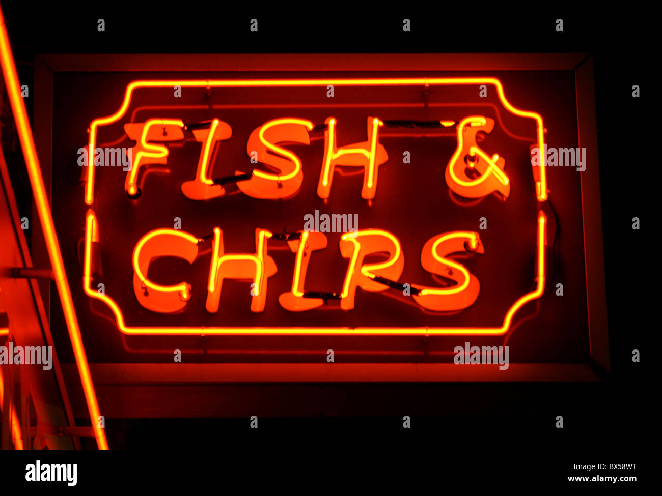 fish and chips neon sign at night Stock Photo Alamy
