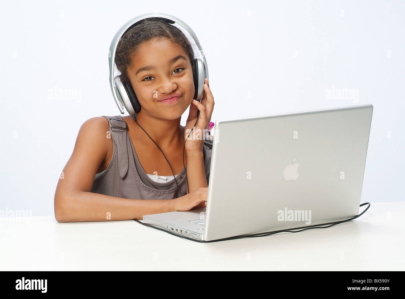 Happy village girl with laptop hi-res stock photography and images - Alamy
