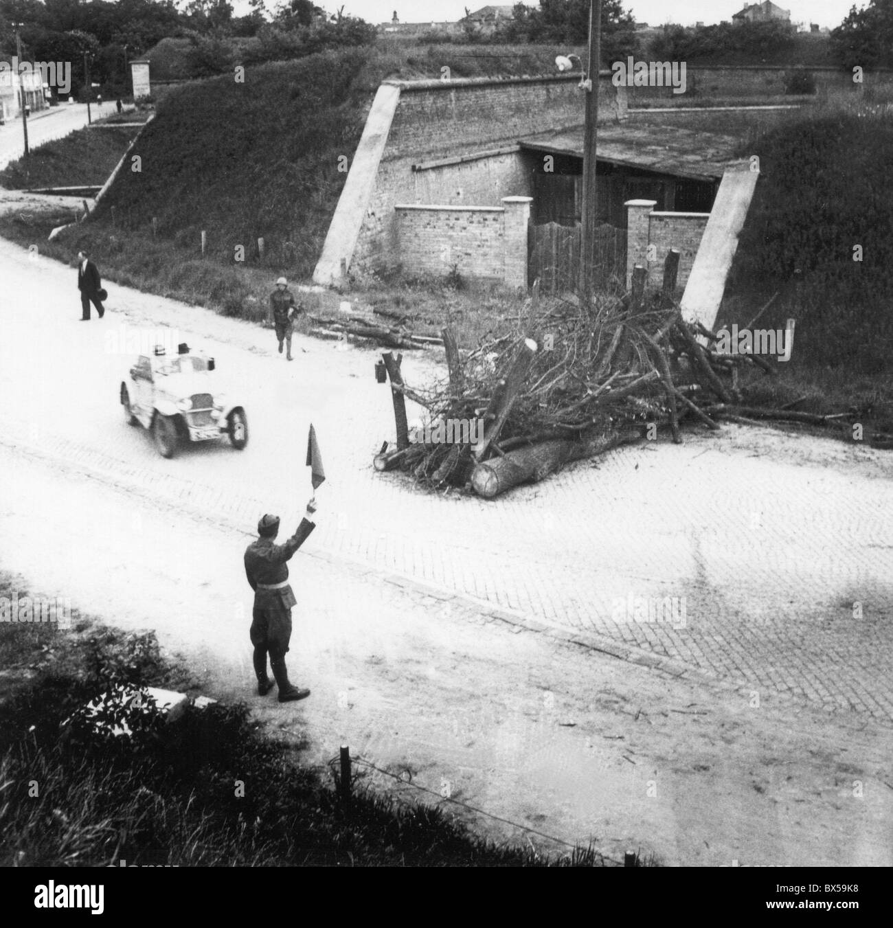 Czechoslovakia - Germany border, 1938, partialy blocked roadway. Stock Photo