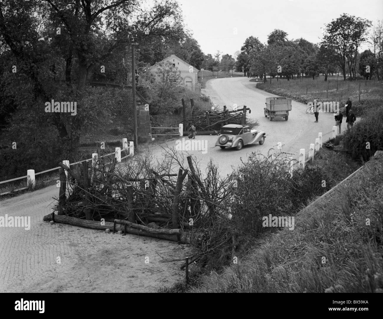 Czechoslovakia - Germany border, 1938, partialy blocked roadway. Stock Photo