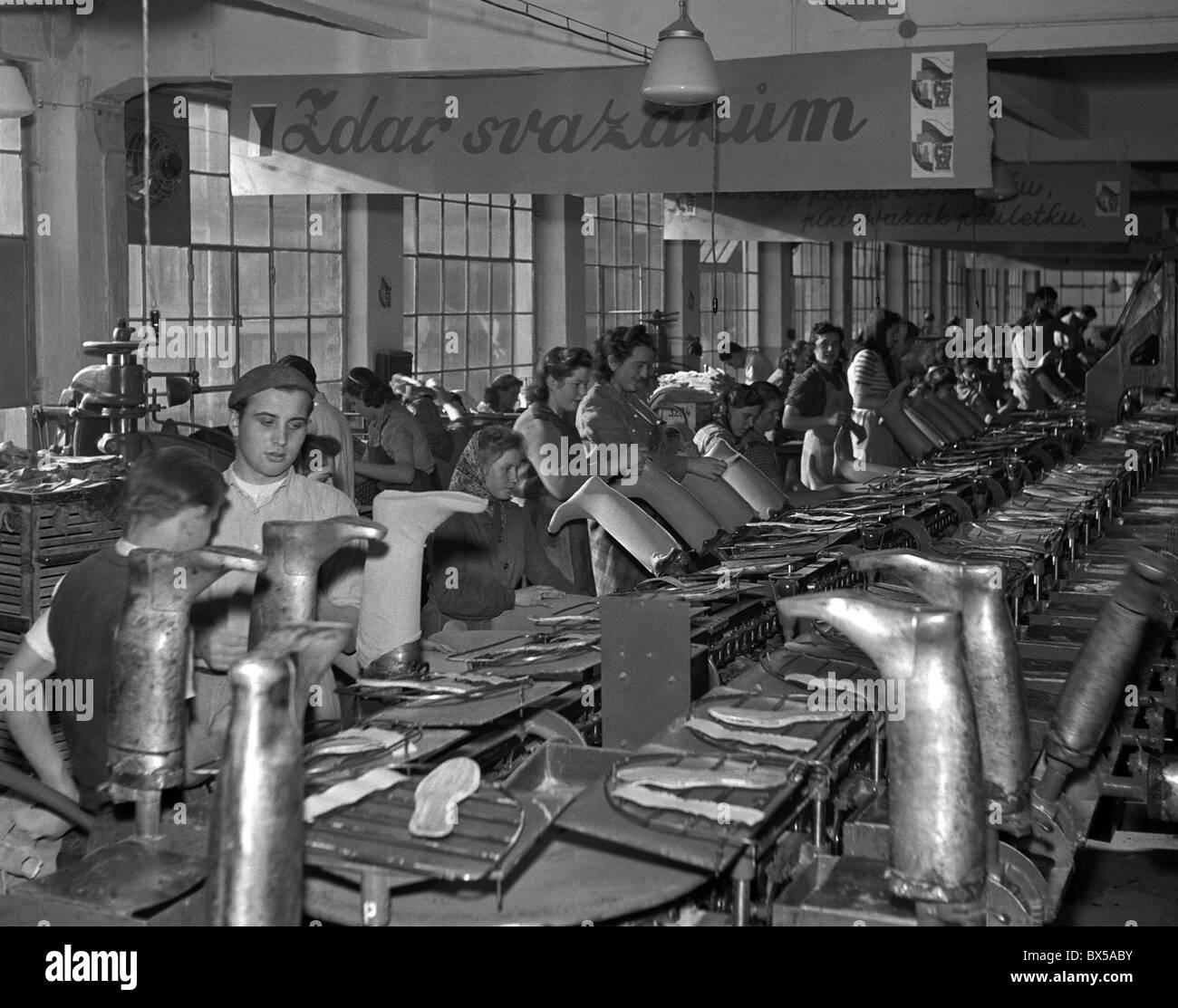 Czechoslovakia - Gottwaldov 1950. Shoe factory workers employed by Svit shoe making factory. This plant was formely owned by Stock Photo