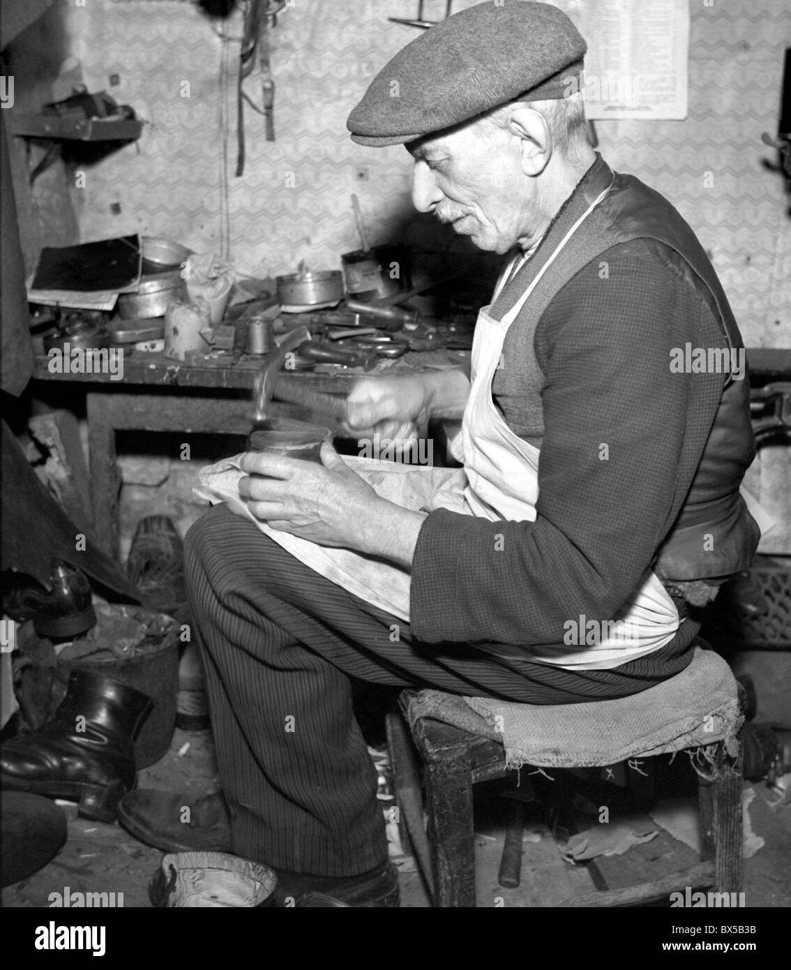 Czechoslovakia 1946, shoe repair. CTK Vinatge Photo Stock Photo