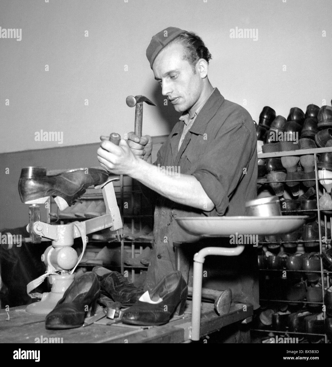 Czechoslovakia 1946, shoe repair. CTK Vinatge Photo Stock Photo