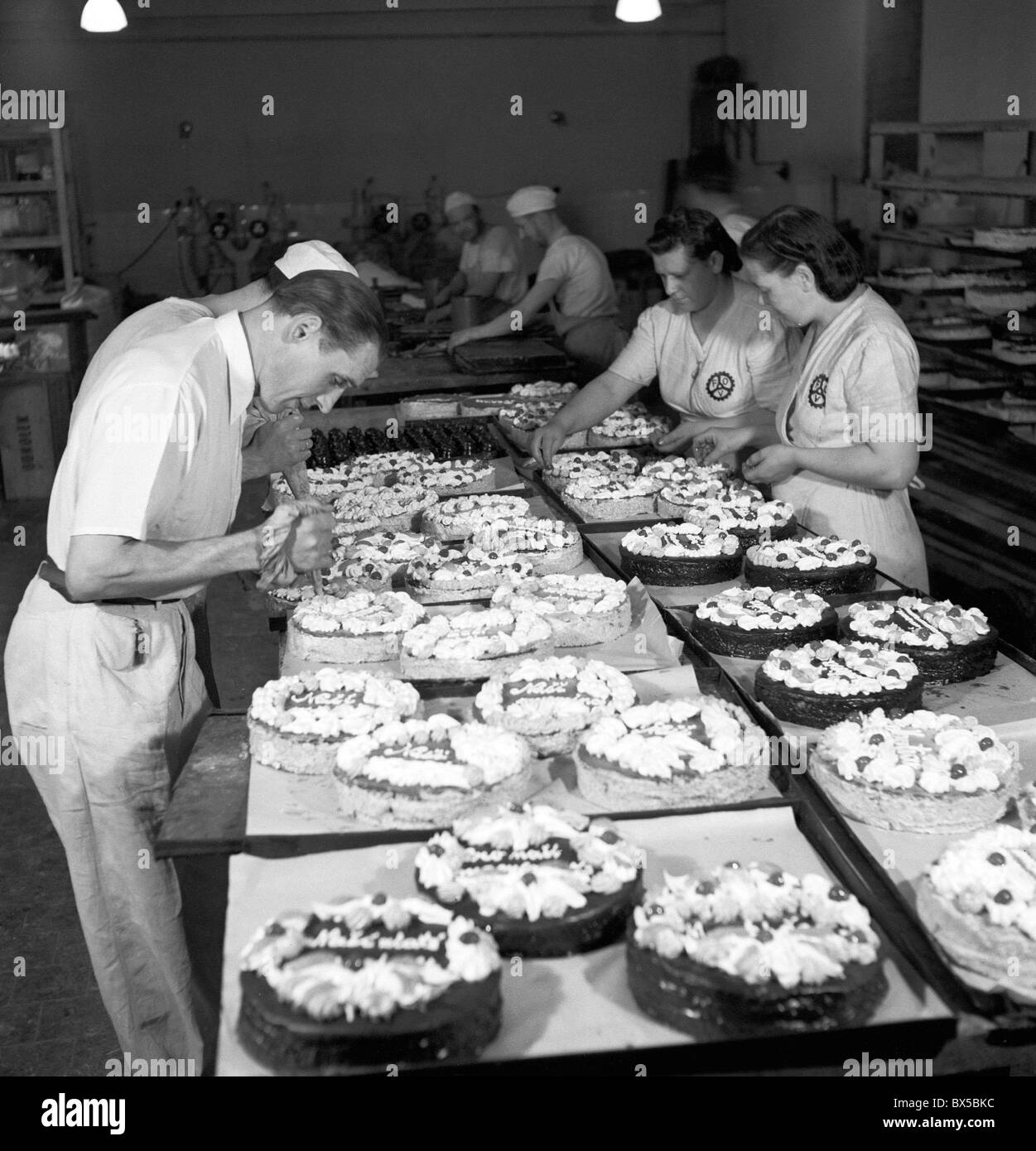 Prague 1947. Cake factory. Workers decorate cakes. CTK Vintage Photo