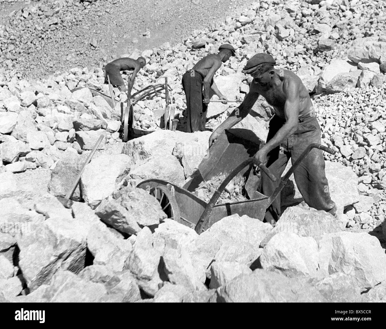 Czechoslovakia, Schtramberg 1948. Limestone mine workers extracting stone. CTK Vintage Photo Stock Photo