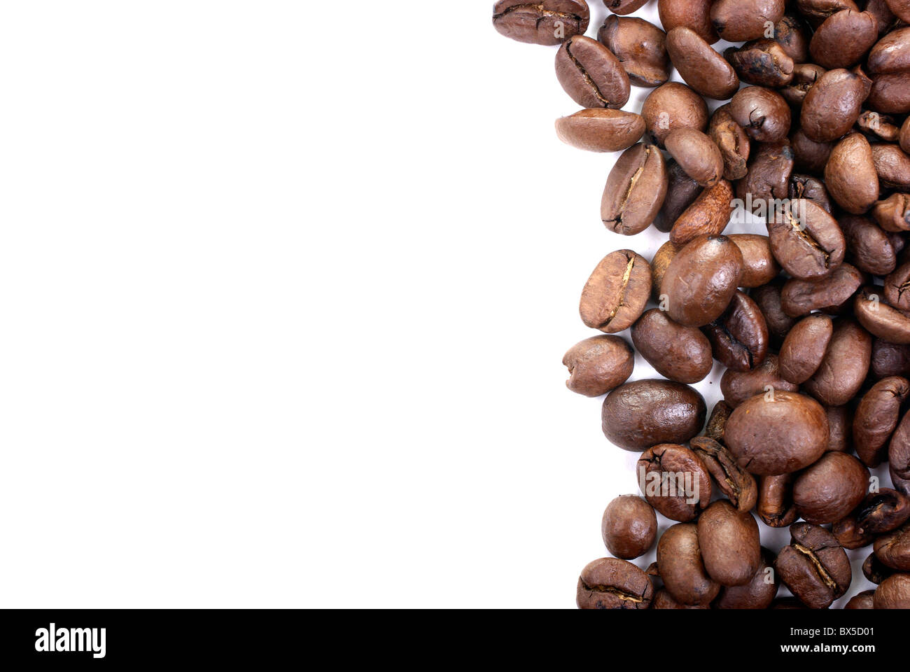 Coffee beans macro isolated on white background Stock Photo - Alamy