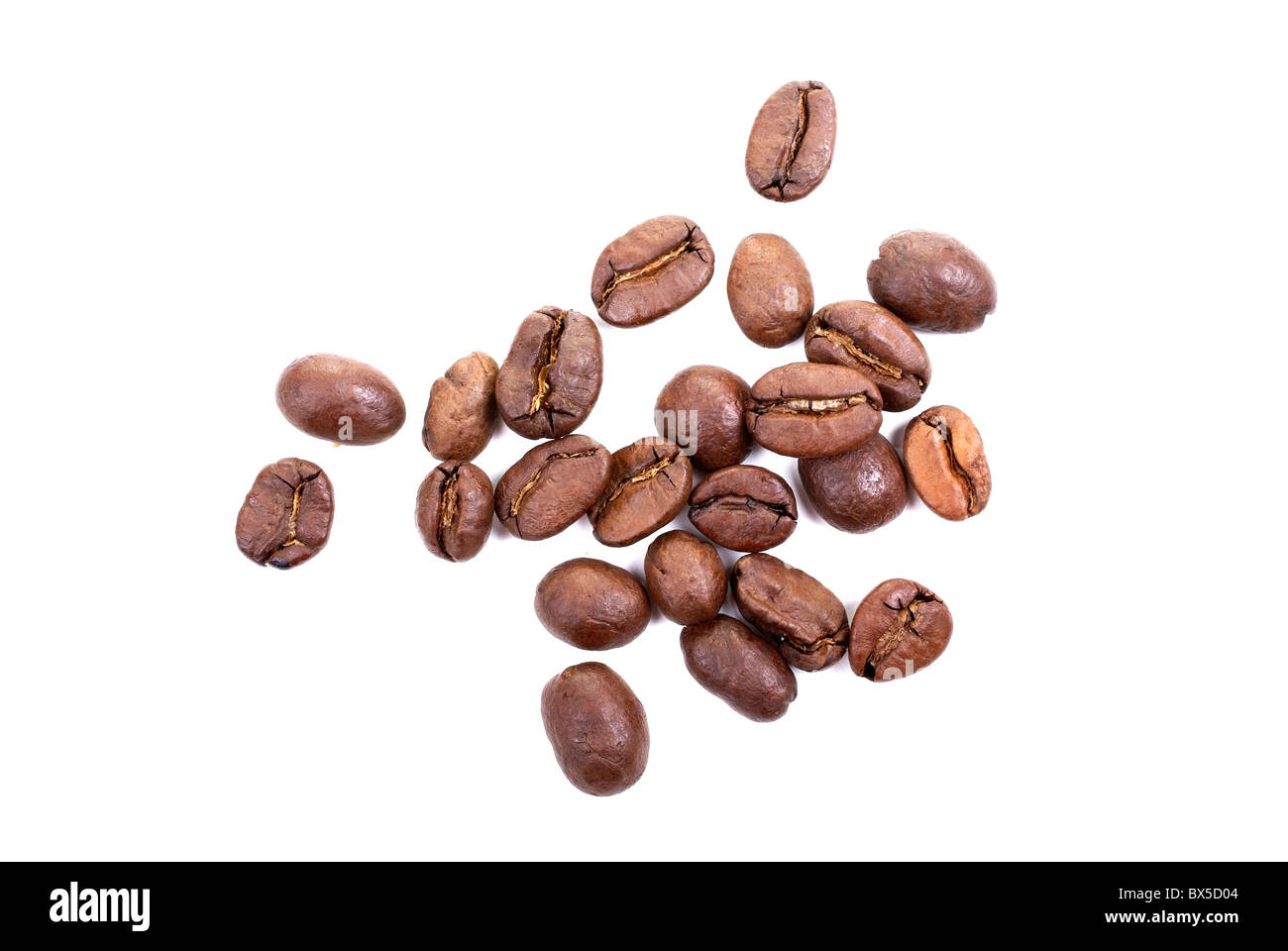 Brown roasted coffee beans isolated on white background Stock Photo - Alamy