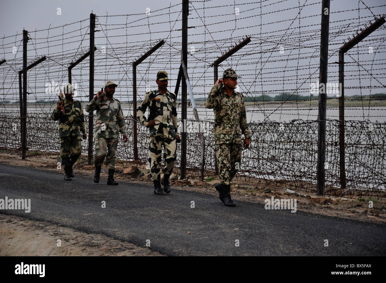 Border Security Force personnel patrolling on India Pakistan border, Stock Photo