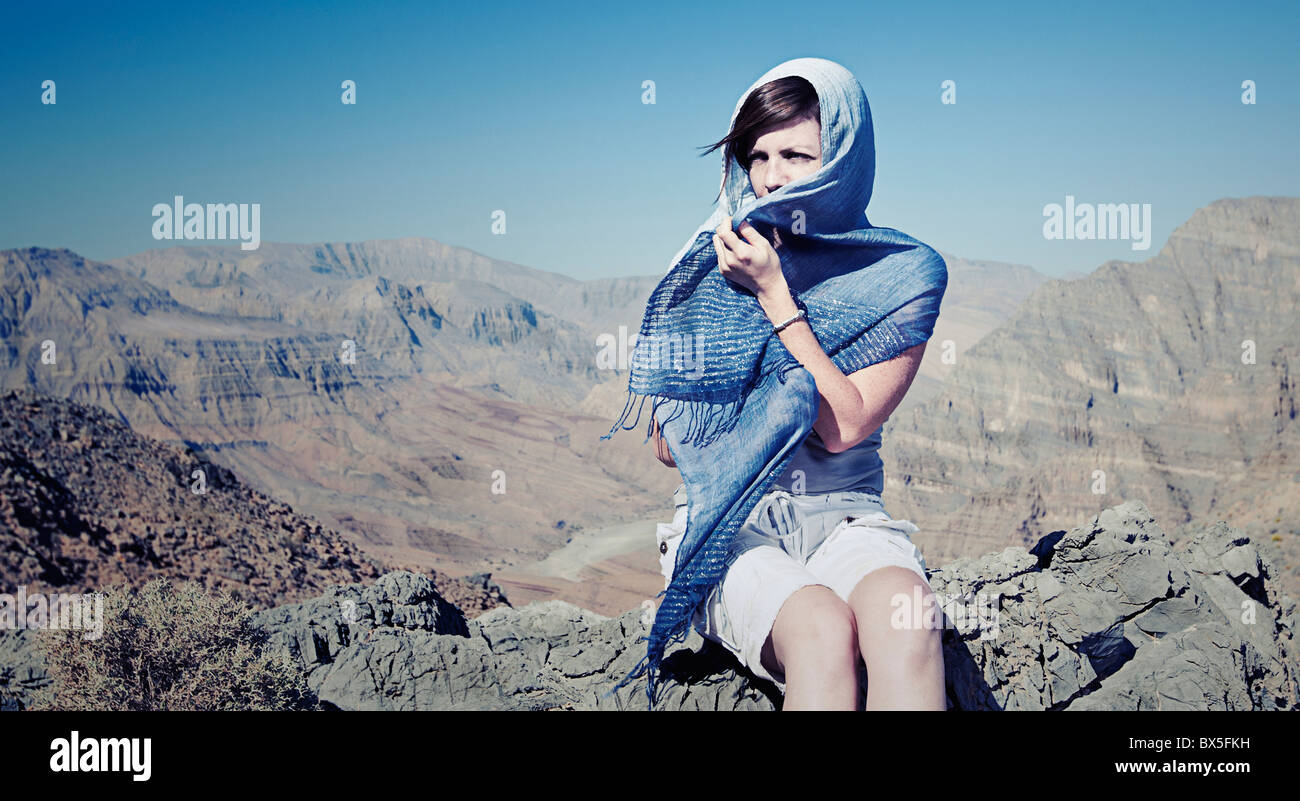 Shot of a Woman in Head Scarf in Omani Mountains Stock Photo