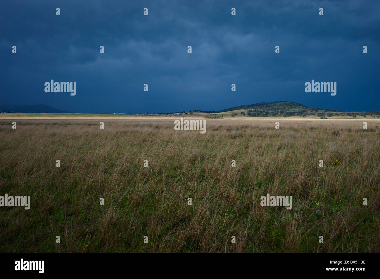 Rural landscape and stormy sky Stock Photo - Alamy