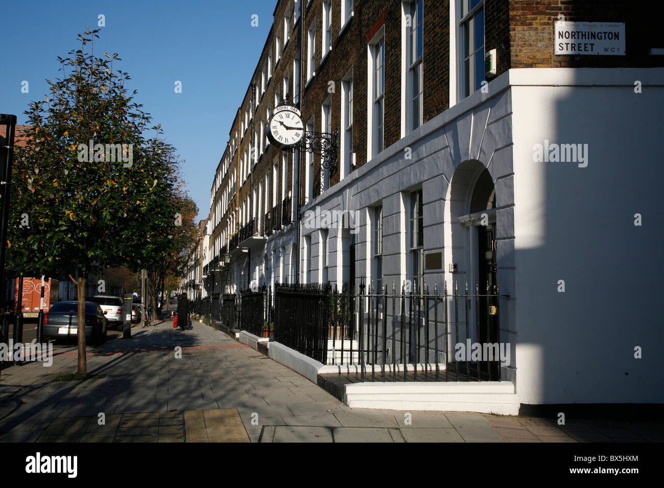 Terraced Georgian housing on St John Street, Bloomsbury, London, UK Stock Photo