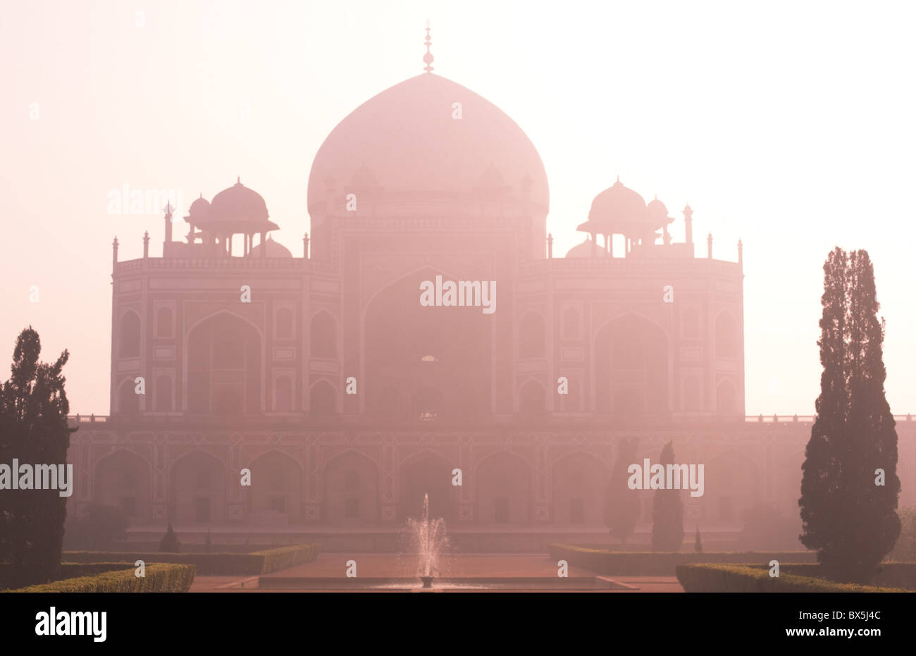 Humayun's Tomb, UNESCO World Heritage Site, the first great example of a Mughal garden tomb, in mist at sunrise Delhi, India Stock Photo