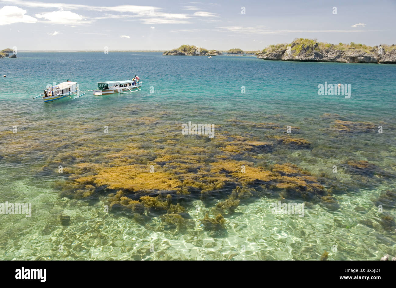 Clear waters between limestone islands, Hundred Islands, Lingayen Gulf, northern Luzon, Philippines, Southeast Asia, Asia Stock Photo