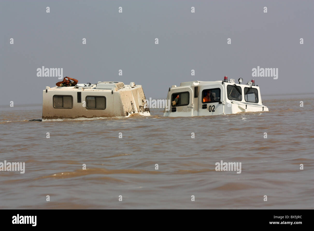 All terrain vehicle floating in water in the creek region of the rann of kutch , Gujarat India Stock Photo