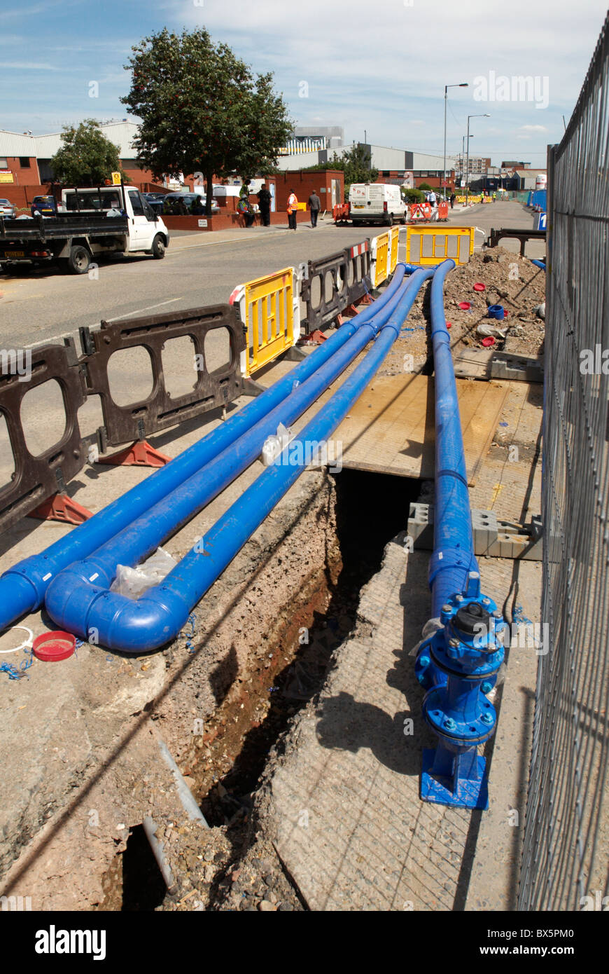 Replacing water pipes West London UK Stock Photo