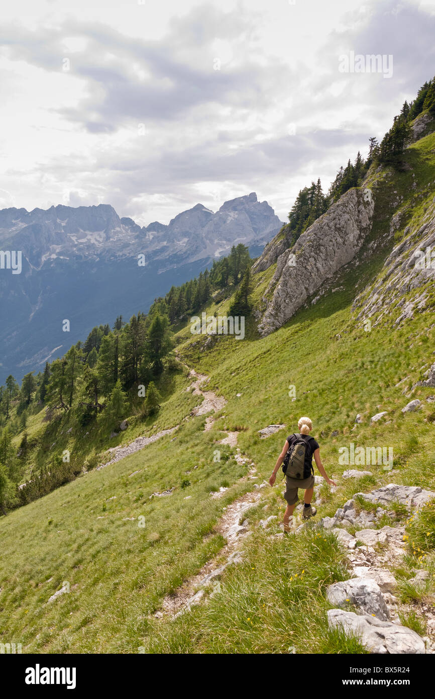 female hiking in the alps, slovenia Stock Photo