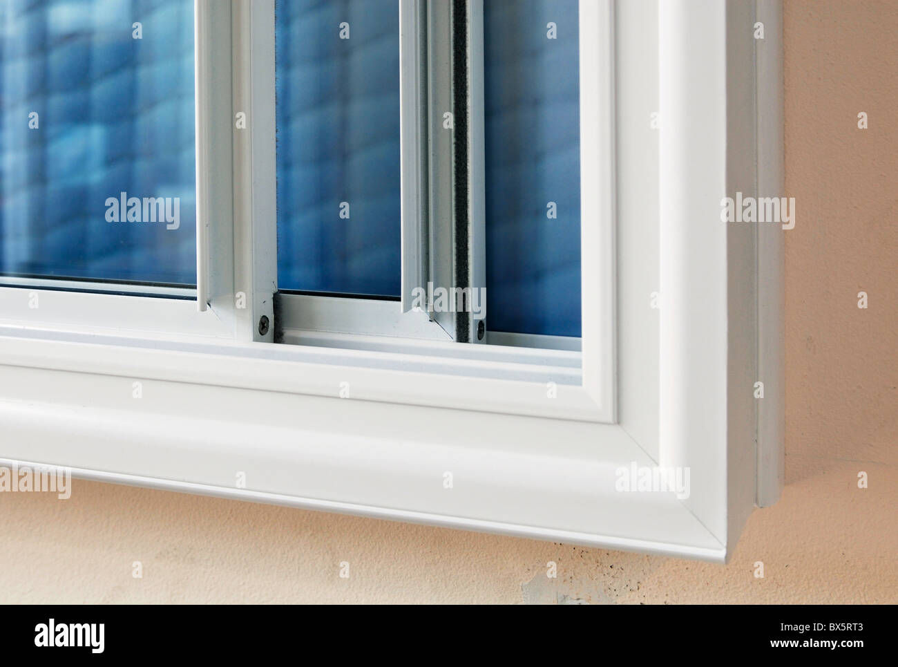 Secondary glazing on window insulates heat and noise Stock Photo