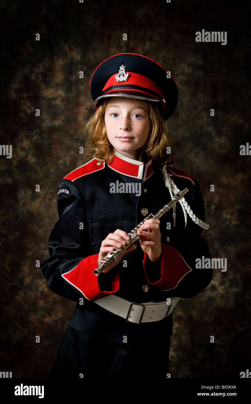 young girl in a marching band uniform with a flute Stock Photo