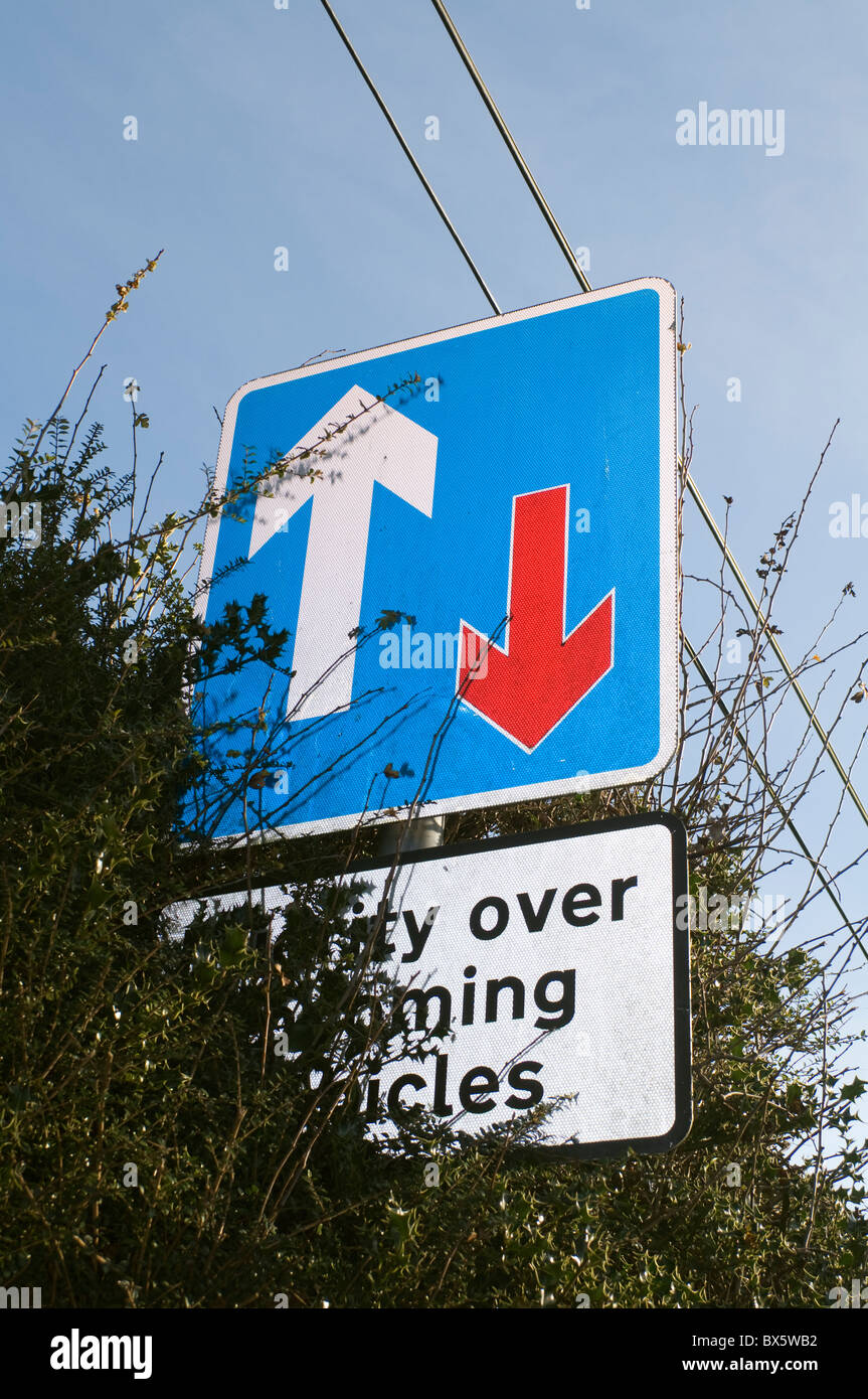 Priority over oncoming vehicles road sign in Chenies Buckinghamshire UK Stock Photo