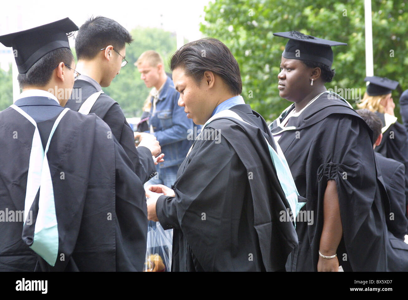 R Graduation Wearing gowns hi-res stock photography and images - Alamy