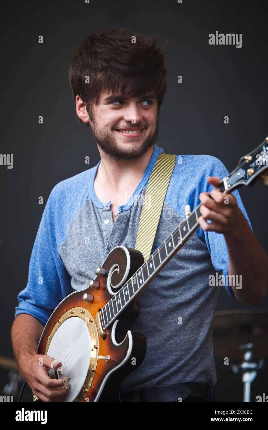 Winston Marshall of the band Mumford & Sons plays banjo and sings vocals at  their gig at the Eden Project 2010 Stock Photo - Alamy