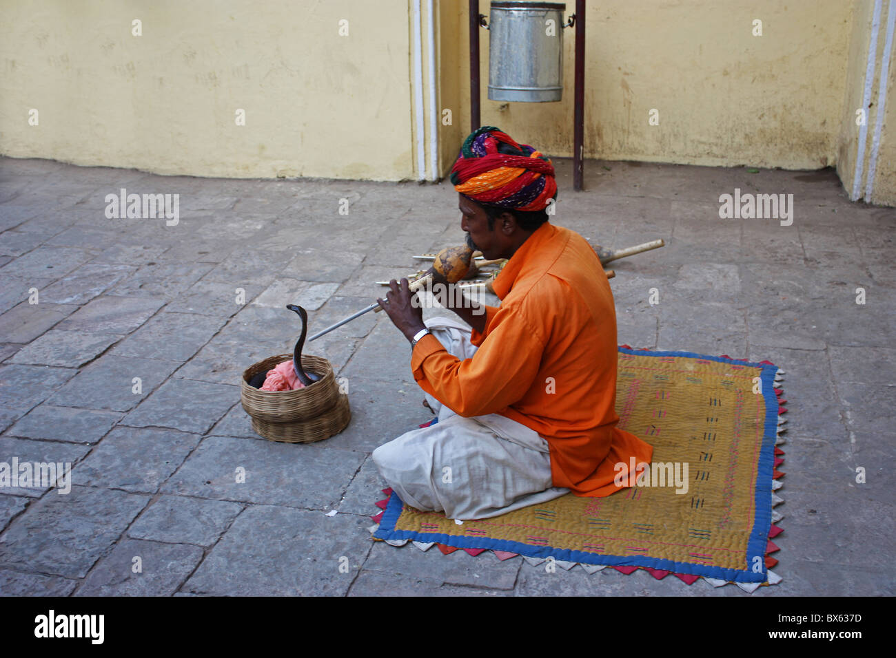 A snake charmer with his cobra Stock Photo