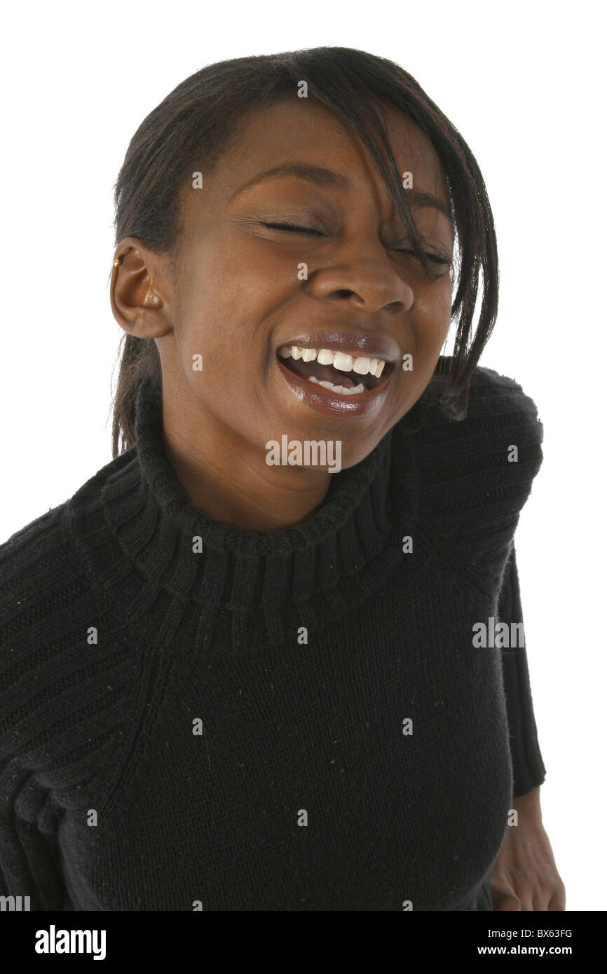 Attractive young african american woman laughing over white background ...