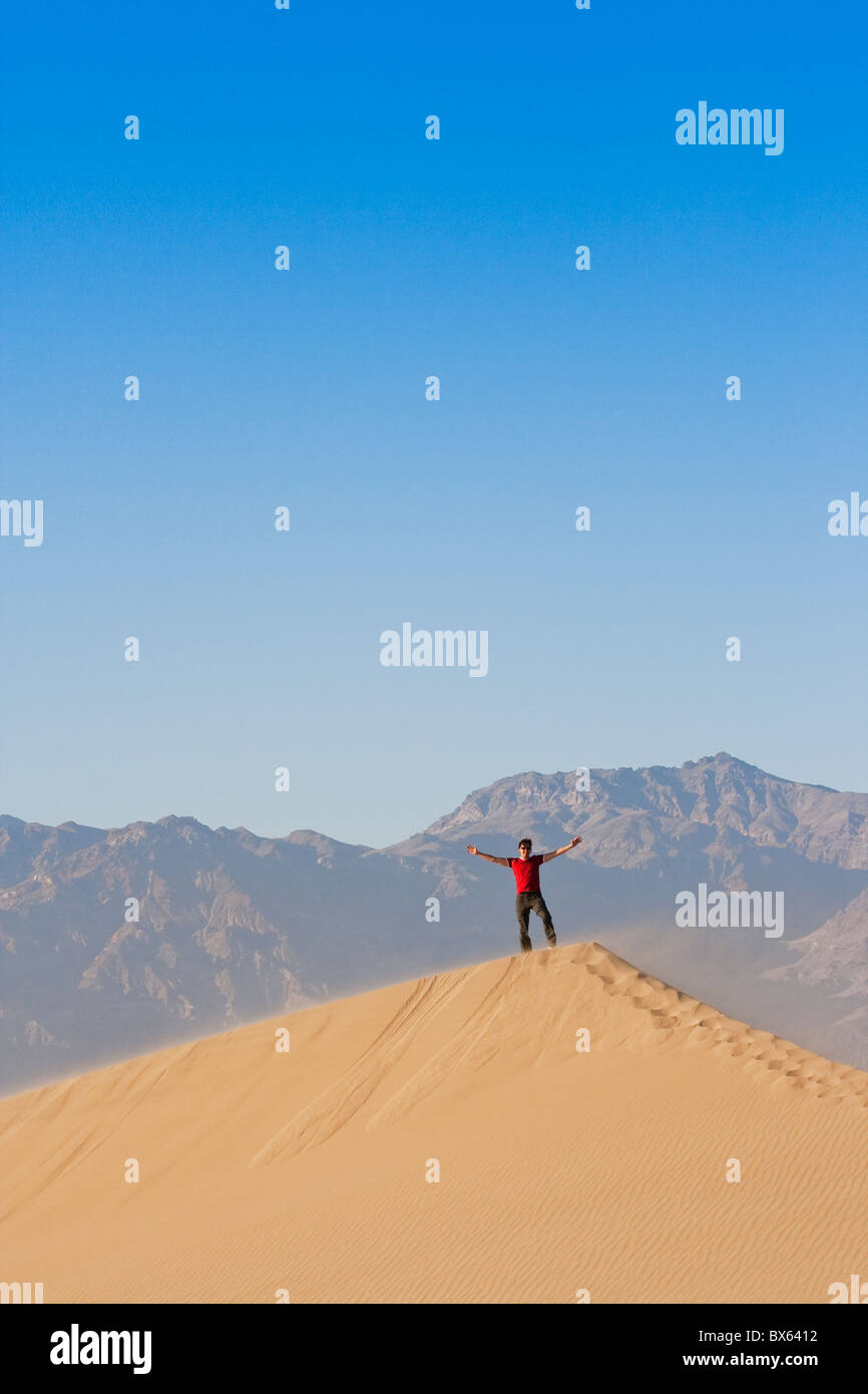 Man standing on the top of a sanddune.Panamint Dunes.California. Stock Photo