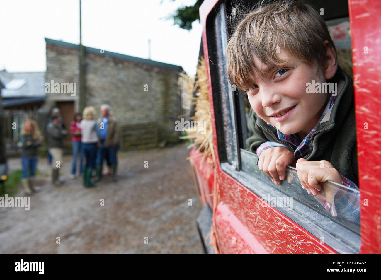 Boy looking out of 4x4 landrover window Stock Photo