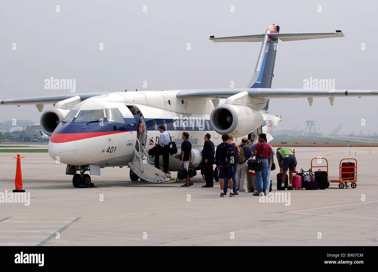 passengers boarding a commuter plane Stock Photo
