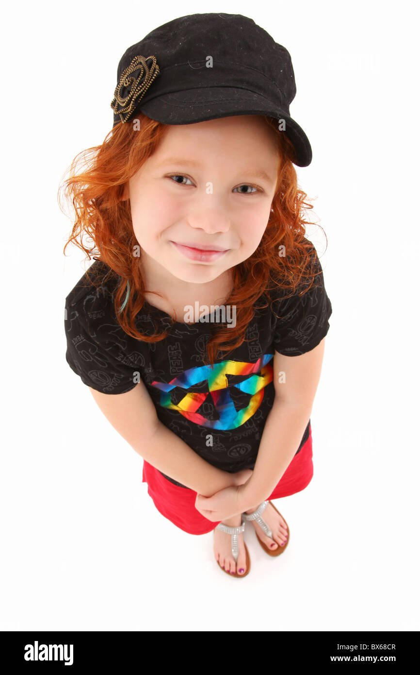Beautiful 7 year old girl with curly red hair standing over white background looking up. Top view Stock Photo - Alamy Beautiful 7 year old girl with curly red hair standing over white background looking up. Top view Stock Photo - Alamy