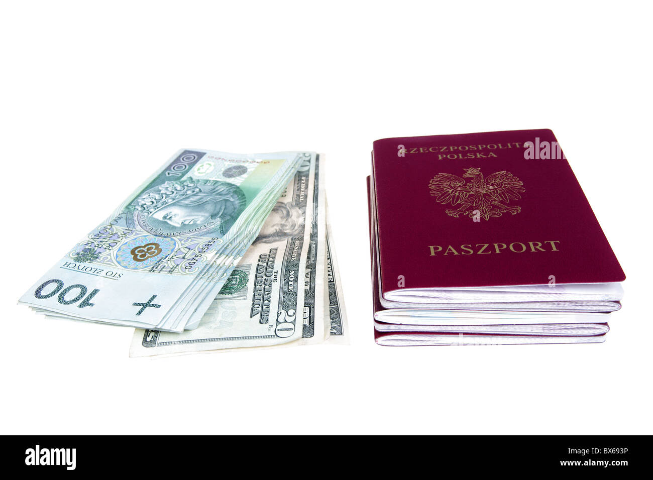 Money and passports isolated on white background Stock Photo
