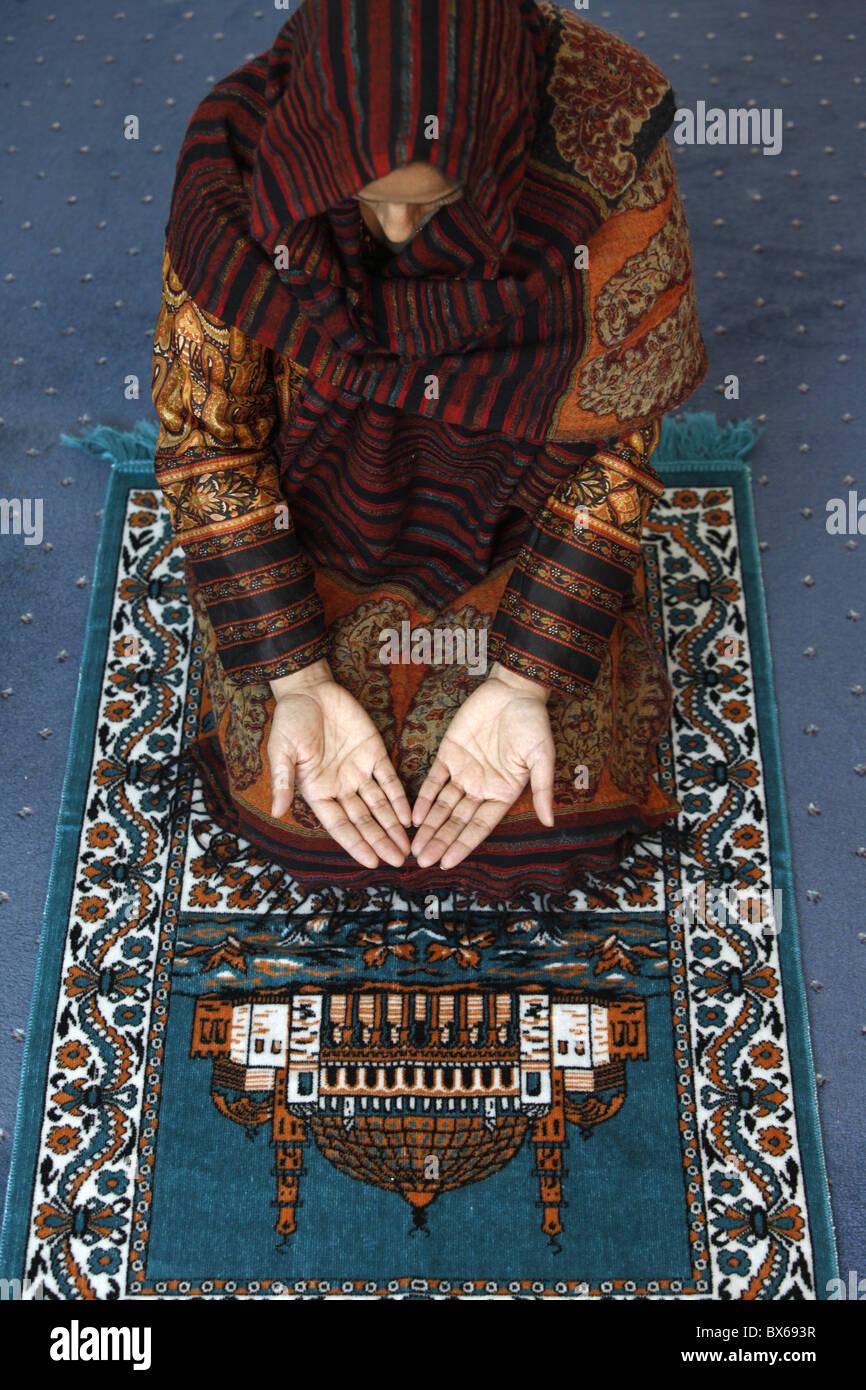 muslim praying on knees