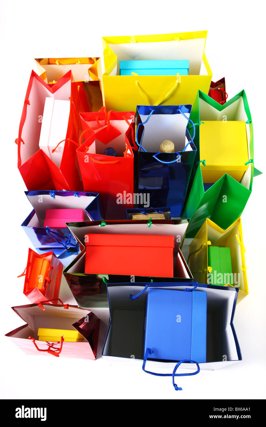 Colorful paper gift bags, filled with cardboard boxes. Stock Photo