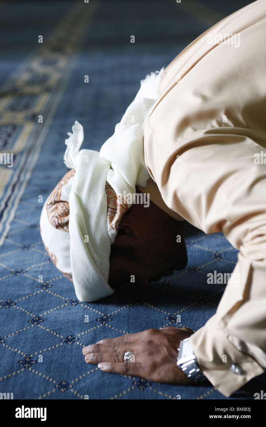 Muslim man praying, Dubai, United Arab Emirates, Middle East Stock Photo