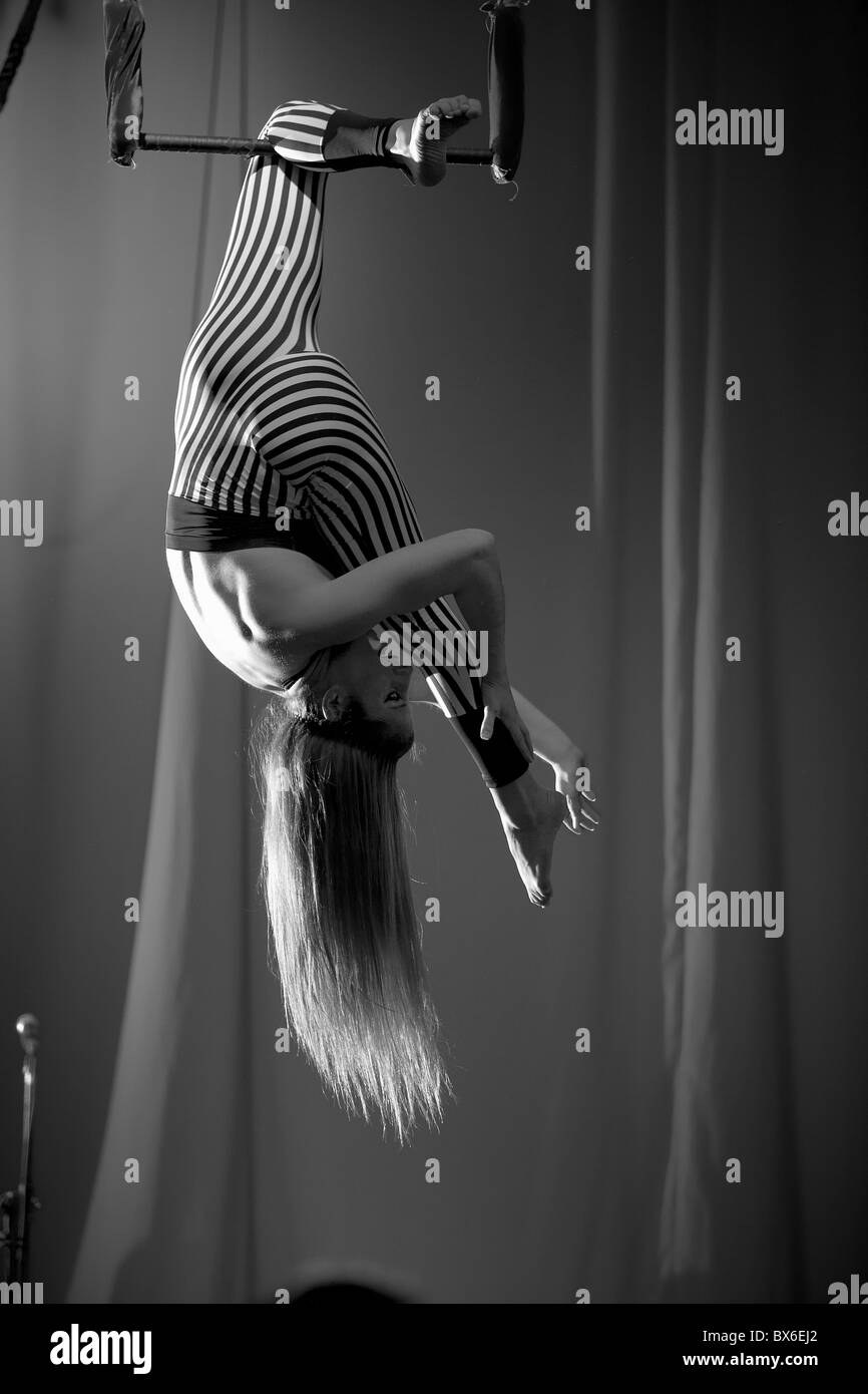 young woman doing trapeze shapes in Buenos Aires, Argentina Stock Photo