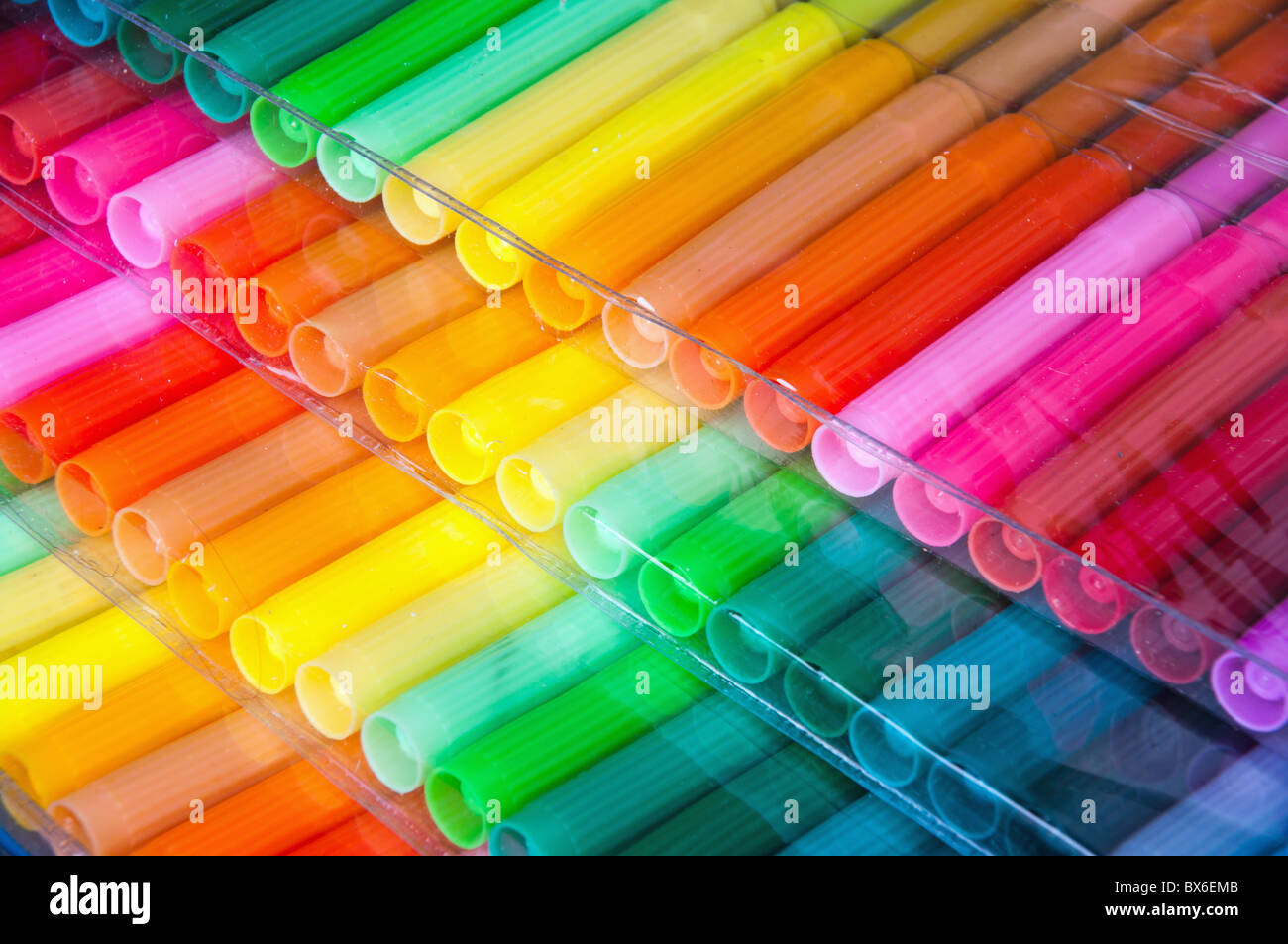 Panels of colour felt-tip pens laid by a fan Stock Photo