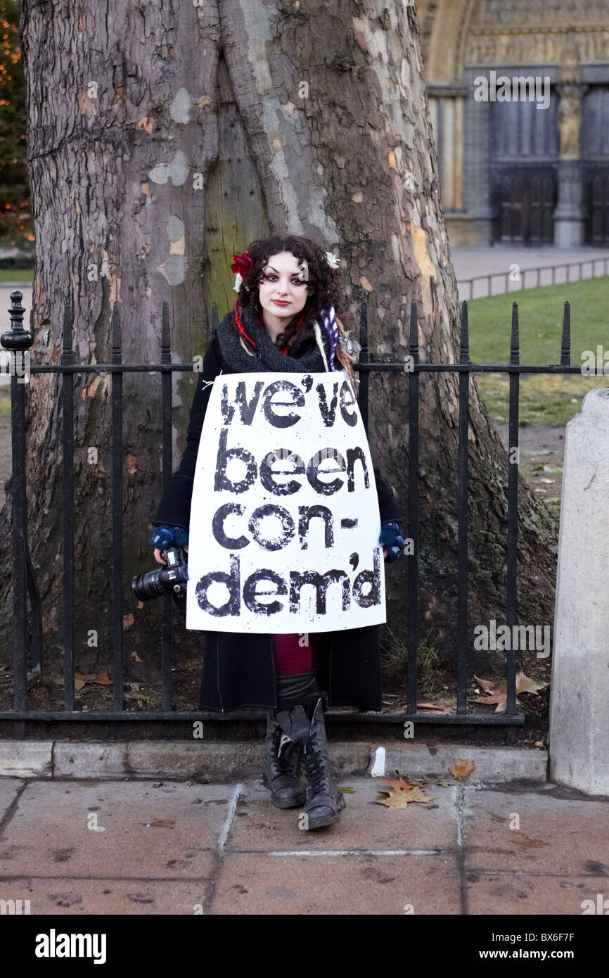 Protester with placard during student protest against tuition fees ...