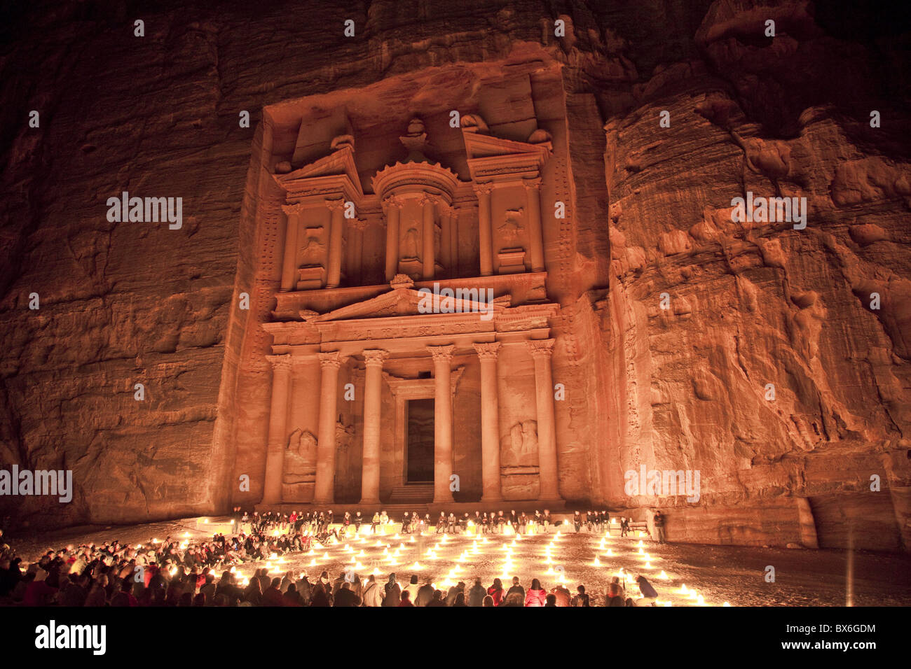 Nightime tourist show in candlelight, in front of the Treasury (El Khazneh), Petra, UNESCO World Heritage Site, Jordan Stock Photo