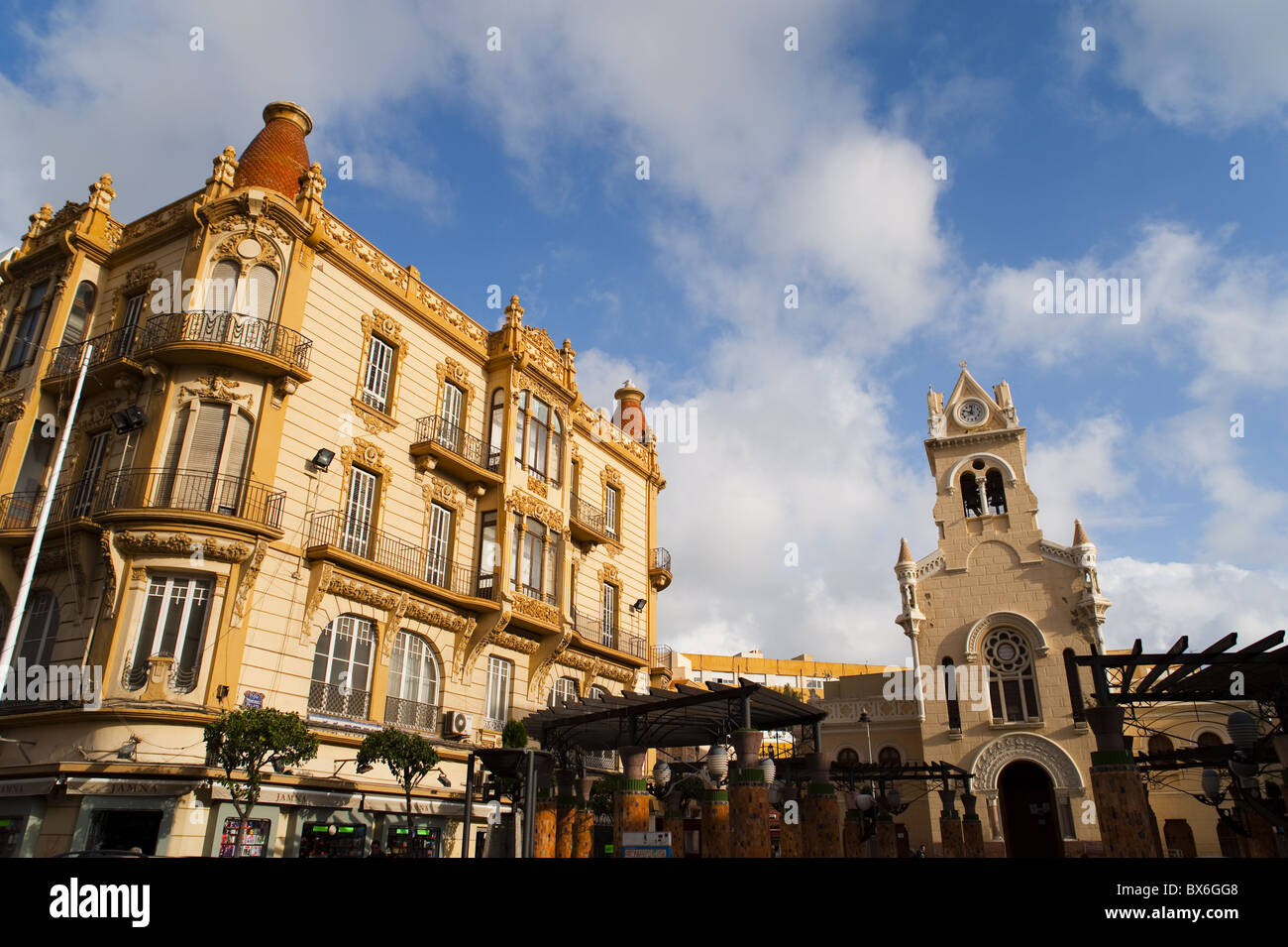 Modernist (Art Deco) building and Sagrado Corazon church, Melilla, Spain, Spanish North Africa, Africa Stock Photo