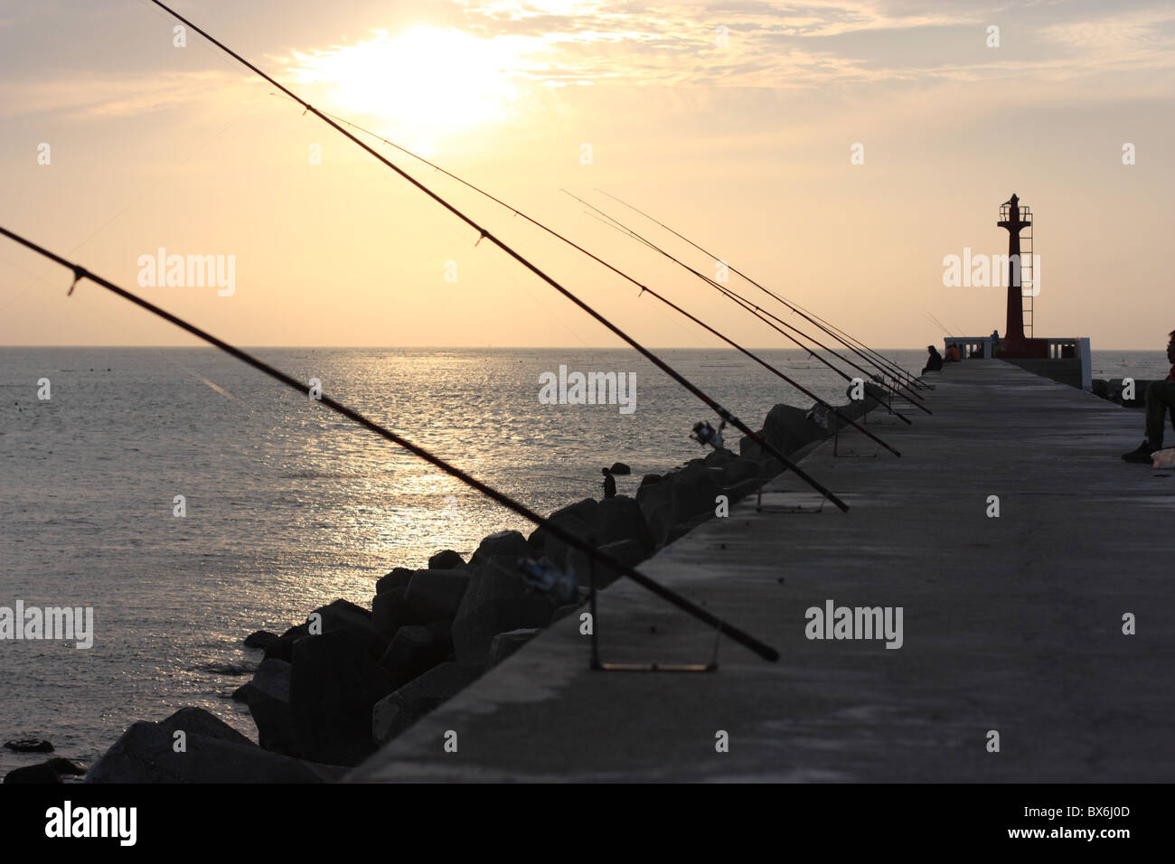 Fishing poles at the entrance to AnPing Harbor Tainan, Taiwan. Stock Photo