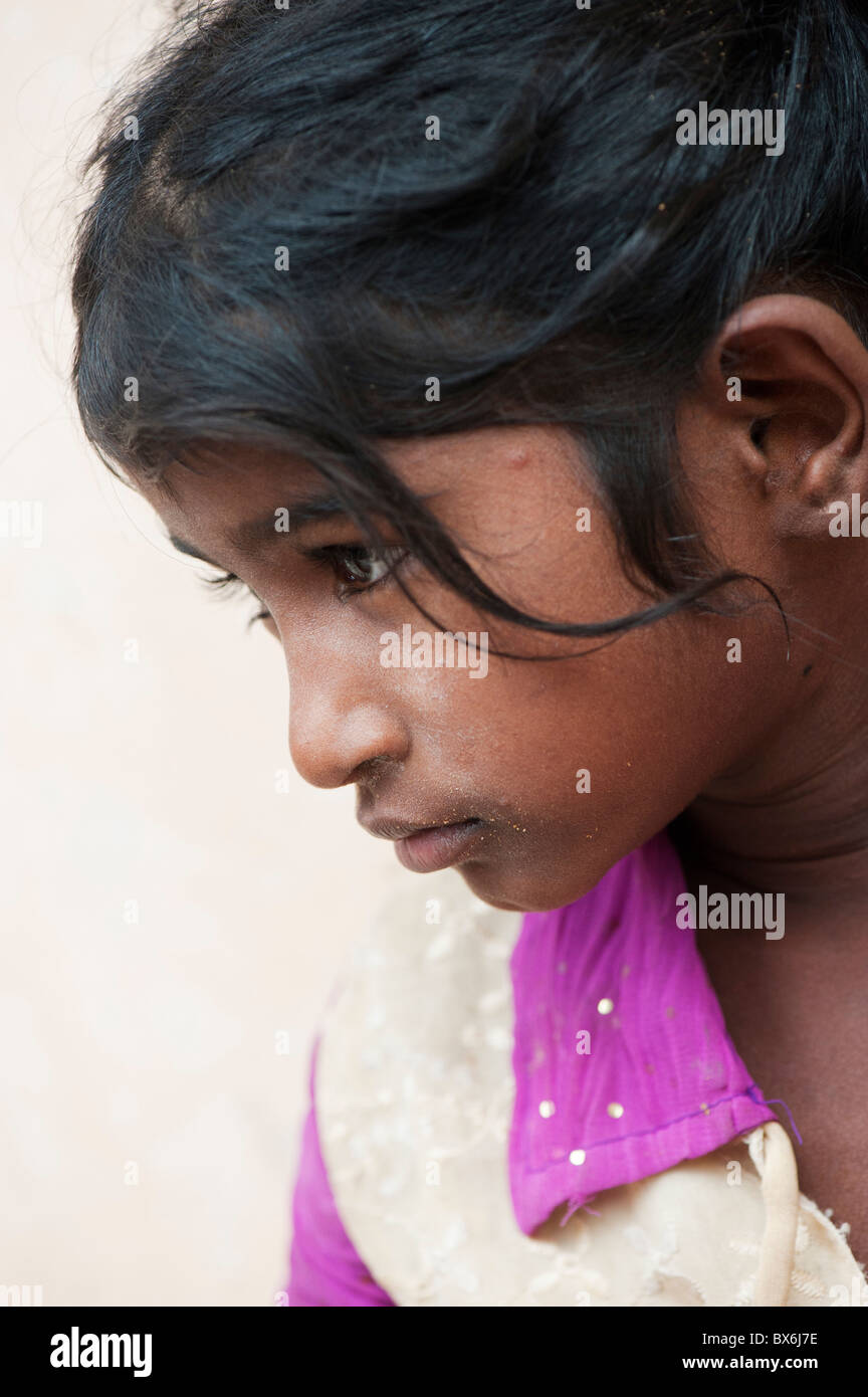 Unhappy young Indian street girl. Andhra Pradesh, India. Shallow DOF Stock Photo