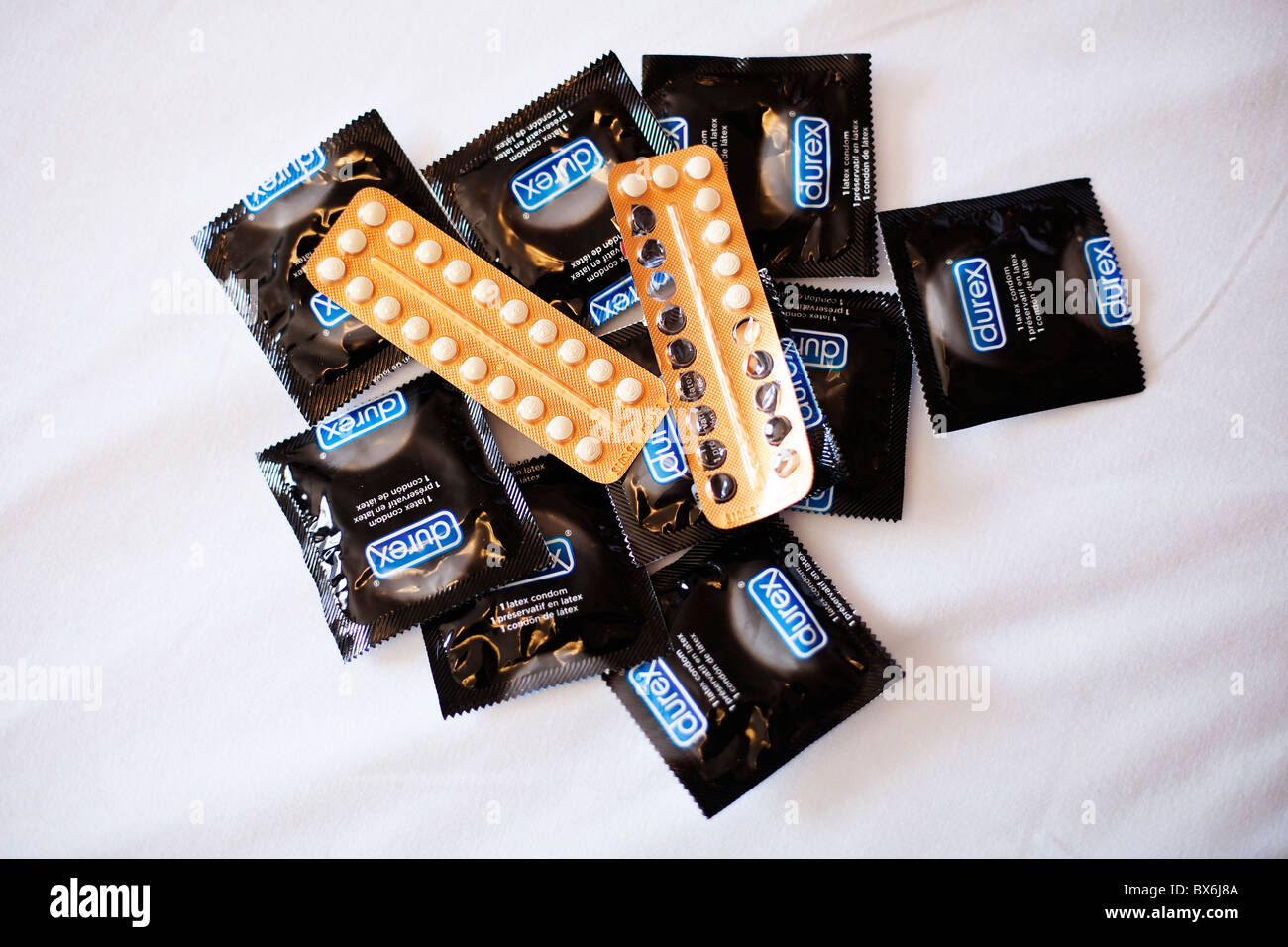 Contraceptive pills, birth-control pill, condom Stock Photo