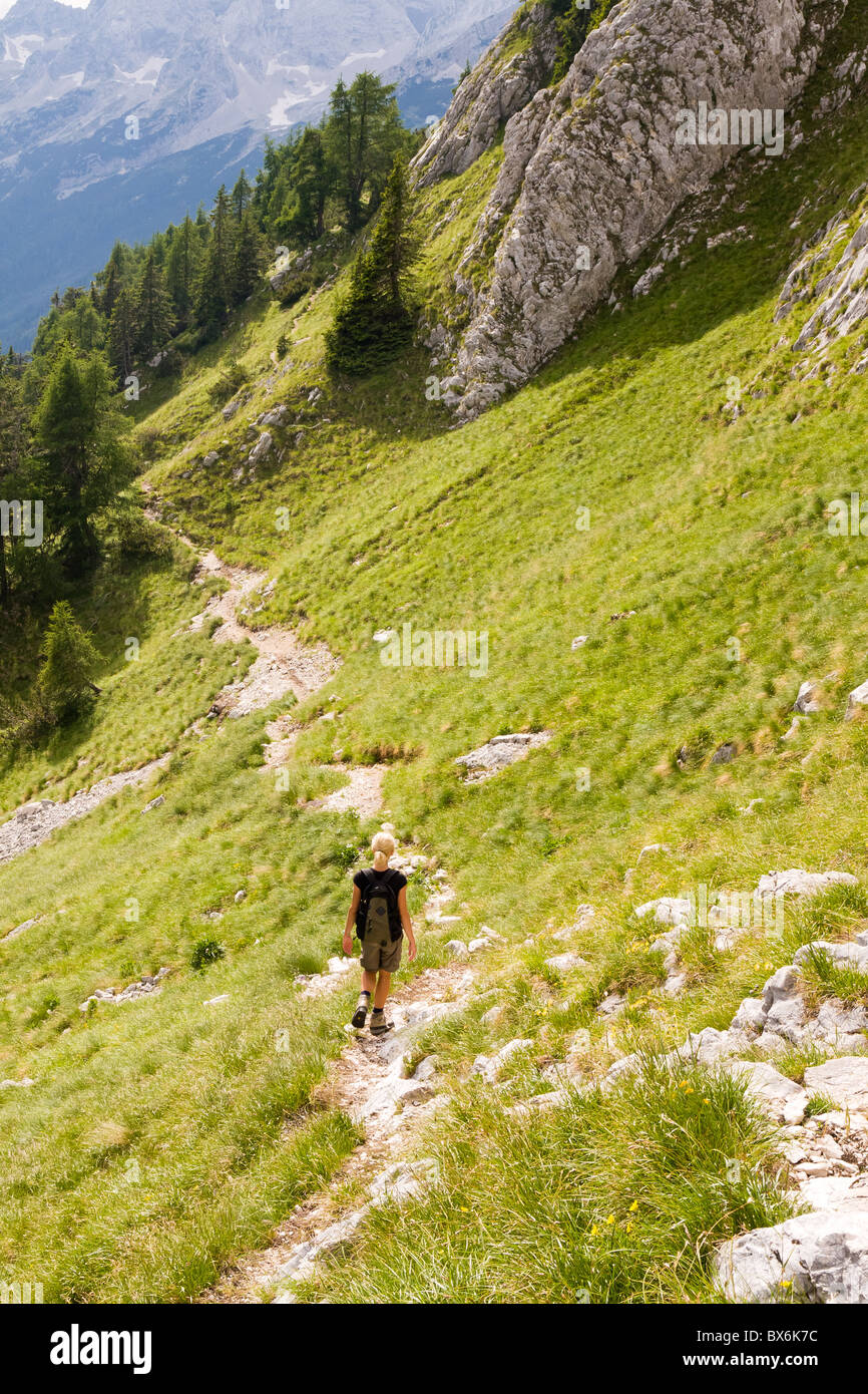 female hiking in the alps, slovenia Stock Photo